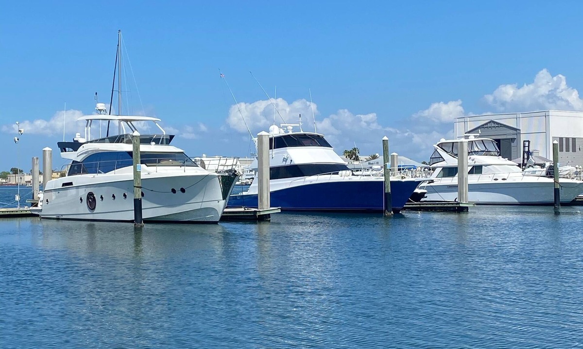Sun Bay South Boat Rental | 48’ Hattaras Sport Yacht onTreasure Island inter coastal near johns pass village
