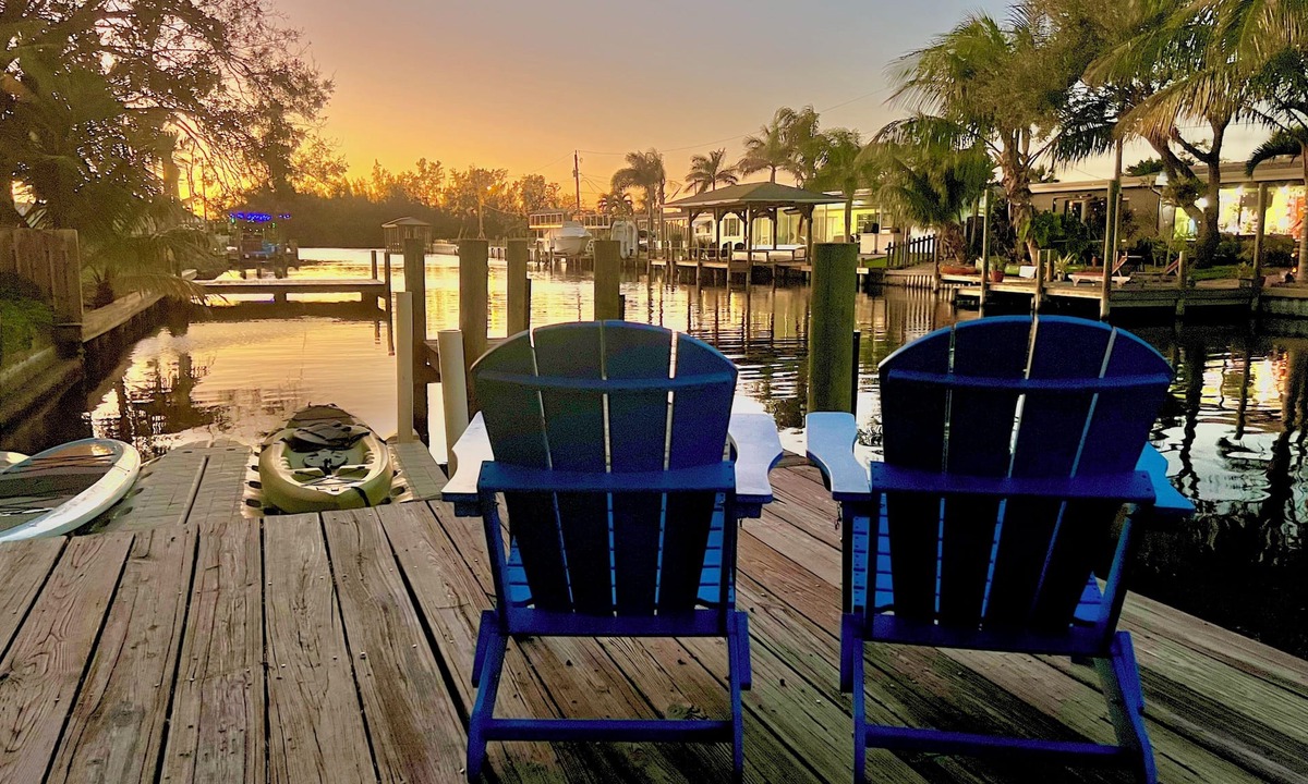 Convair Cove House | 4BR Waterfront Retreat - Private Dock, Kayaks, Hot Tub & Tiki Bar Walk to Beach