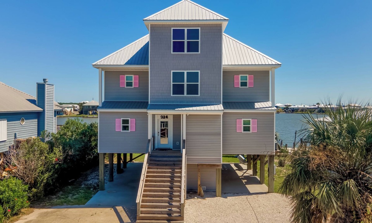 Royal Lagoons House | 5 Bedroom Home on Laffite Bay! Short walk to the beach!