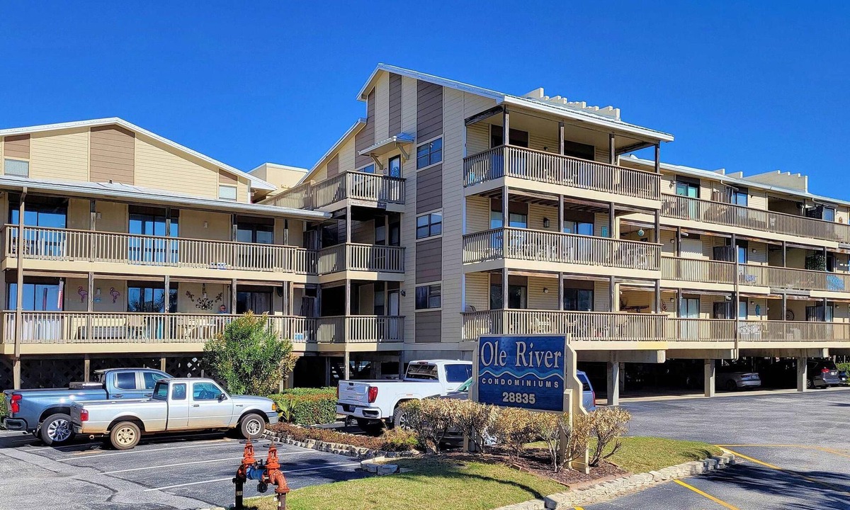 Orange Beach East Condo | A short stroll to the white sand beach of the Gulf of Mexico and Ole River.