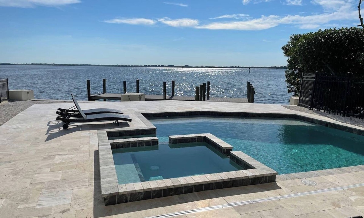 Whitney Beach House | Bay beauty with heated pool, spa, games, ping pong