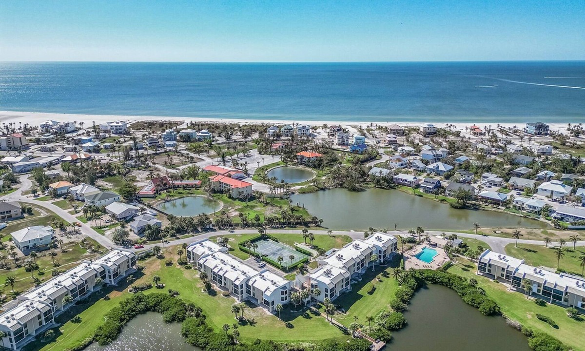 Mid Island Condo | Bayview Bliss Near the Beach with Resort Amenities & Sunroom - Serenity by the Shore