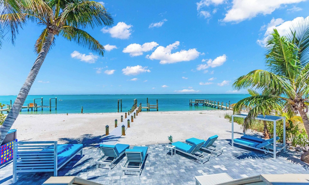 North Captiva House | BEACHFRONT LUXURY ISLAND HOME PRIVATE SWIM SPA~FISHING DOCK~GOLF CART STUNNING