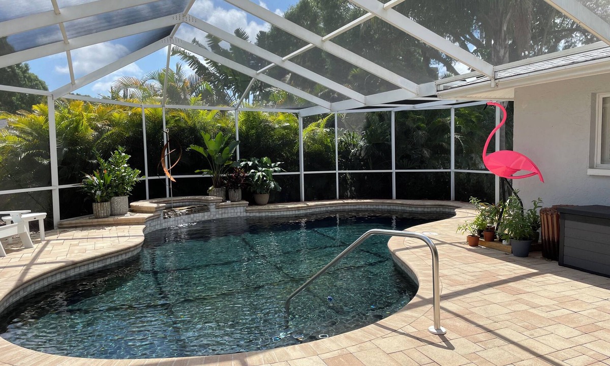 Feather Sound House | Beautiful 4-bedroom house in Clearwater with lagoon like heated pool & hot tub.