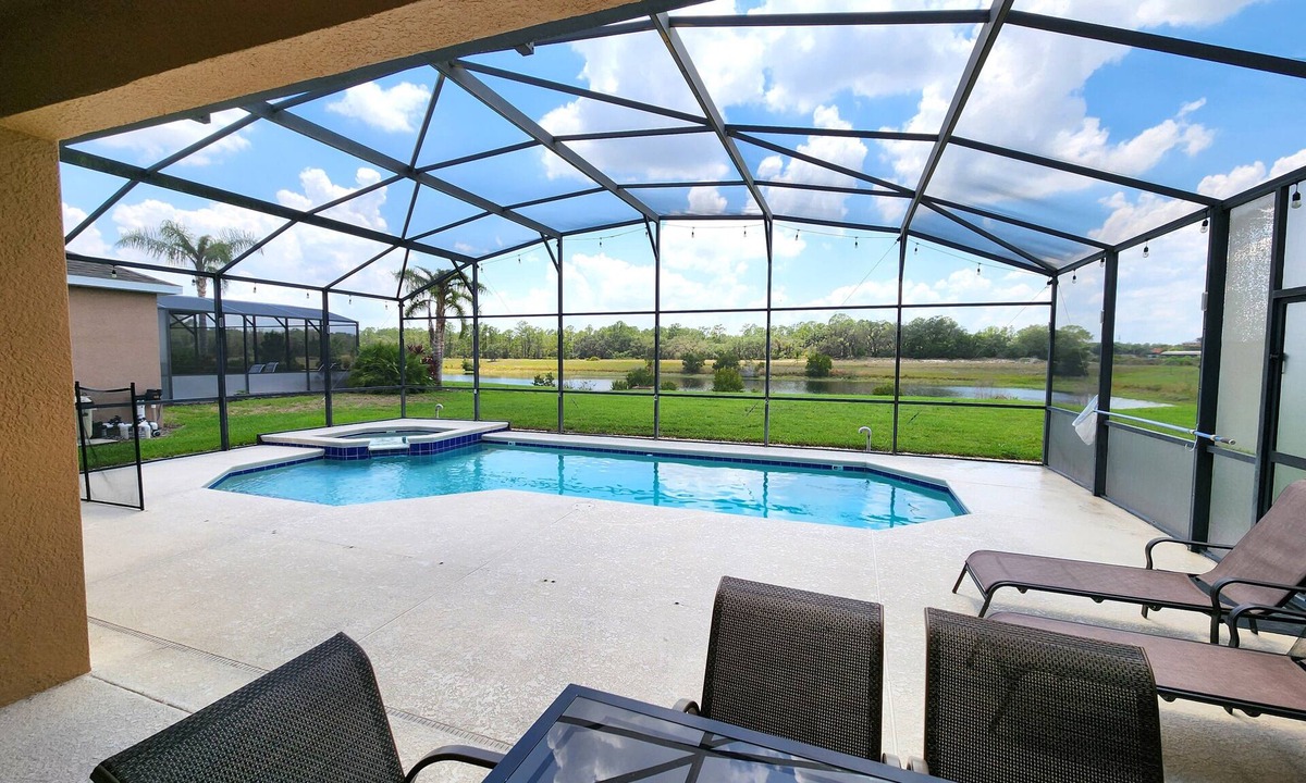 Watersong Villa | Beautiful 5 bedroom villa with private pool, spa & lake view!