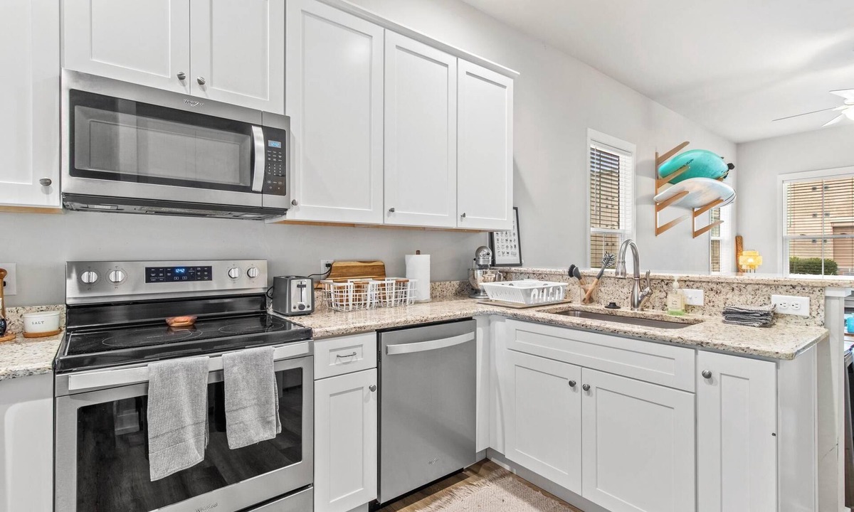 Pleasant Street House | Breezy Blue Bungalow in Heart of Pleasant Street