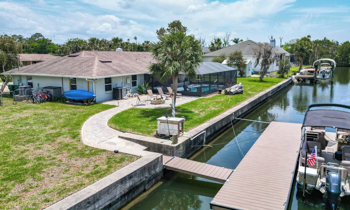 Indian Waters House | Canal-front 4BR/2BA home with pool and brand-new dock—room for 2 boats! Recently remodeled, 2-car garage, and minutes to the Gulf. Perfect Crystal River getaway! Boat and trailer parking on property; ramp nearby.