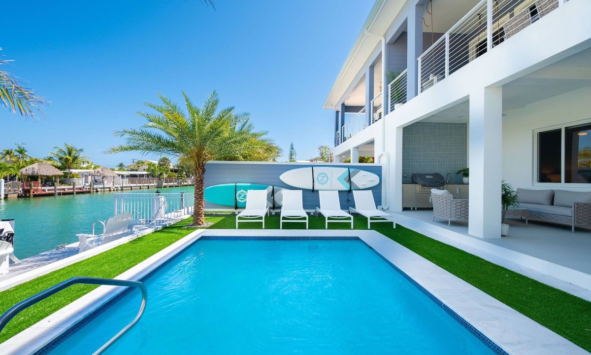 Key Colony Beach House | Canal Front with Cabana Club Privileges! Paddleboards, Bikes, Kayak in KCB!