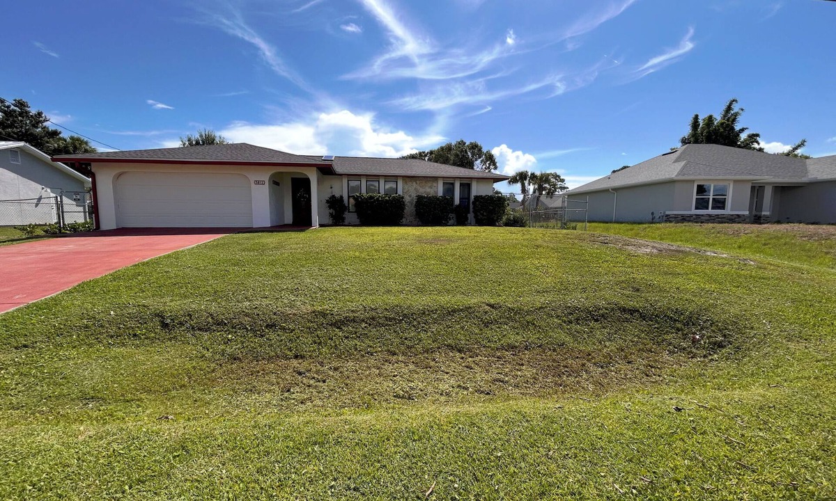 Indian River Estates House | Coastal Comfort Retreat - Pet-Friendly Paradise w/Fenced Yard, Fire Pit & Lanai