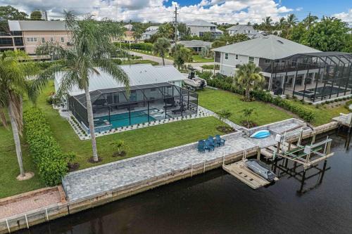 Estero Bay Shores House | Cozy 2 bedroom on the canal with pool and hot tub!