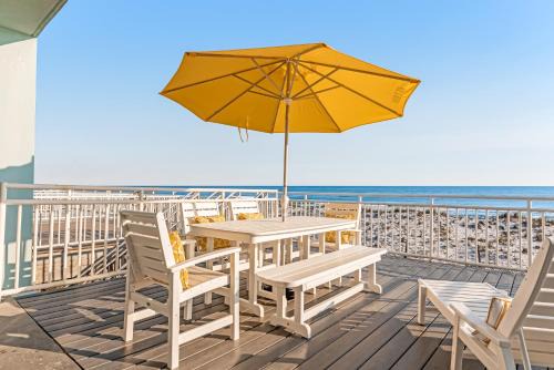 White Sands House | Dog-friendly beachfront dream with a wet bar & two furnished balconies