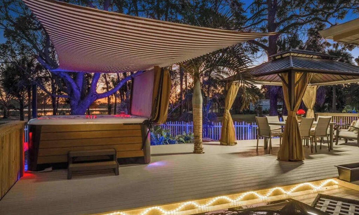 East Naples House | Dog-friendly lakefront home with hot tub, gazebo, firepit, outdoor kitchen, W/D