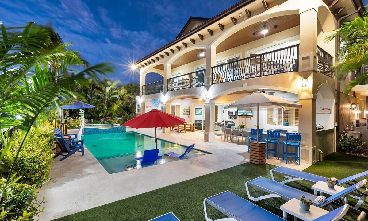 Key Colony Beach House | Elev 5BR/8BA Game Room 75’ Deep Canal Dock Ice Maker Kayaks Bikes