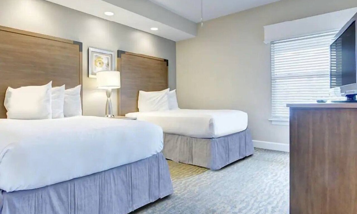 West Kissimmee Hotel | Enjoy Scenic Views from a Stylish Condo in a Relaxing Retreat | Outdoor Pool