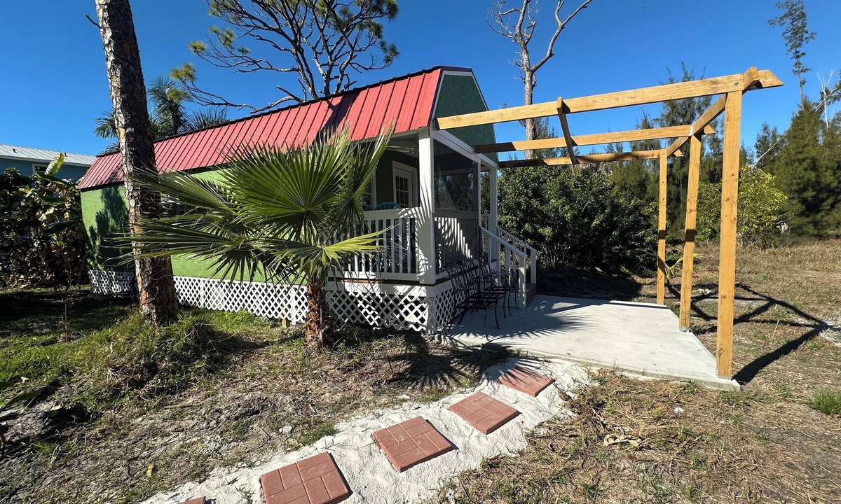 Saint James City Cabin | Glamping Cabin with a shared pool in the middle of best that nature has to offer