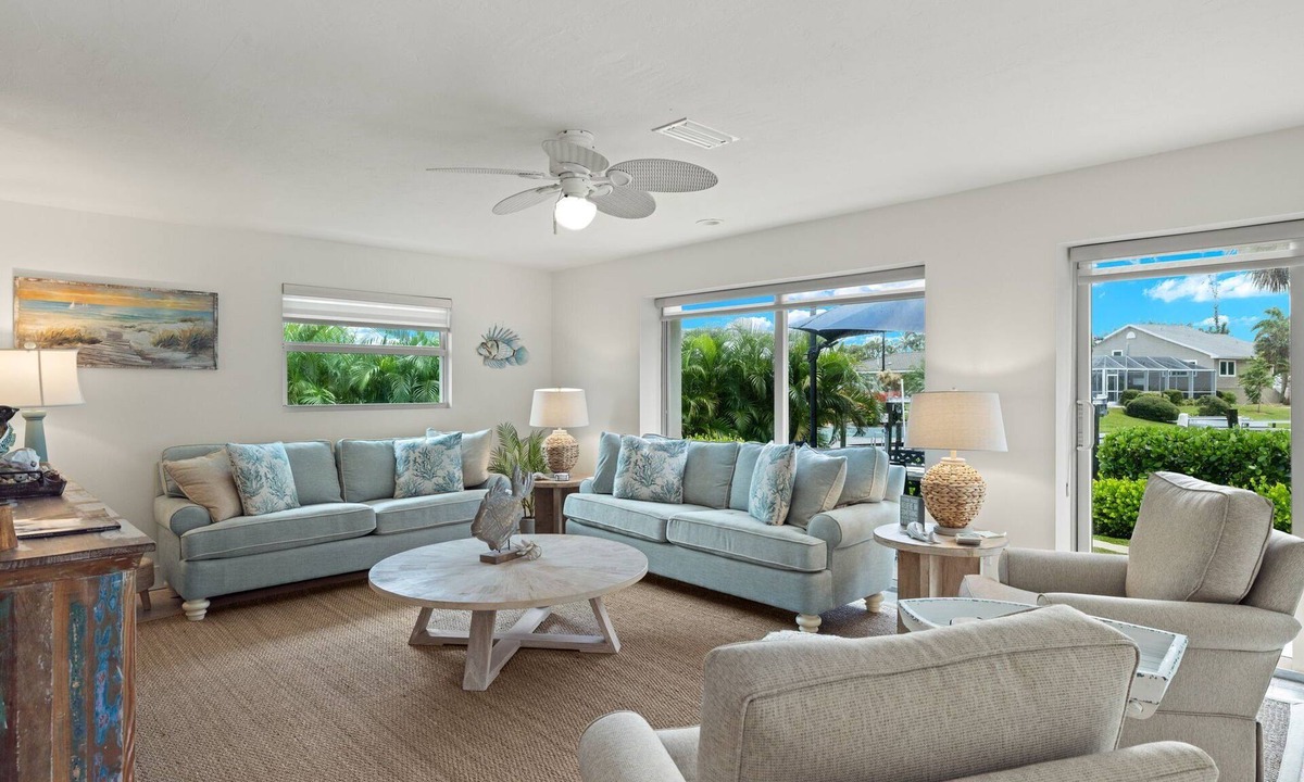 Shell Harbor House | Gorgeous canal front home walking distance to the beach!