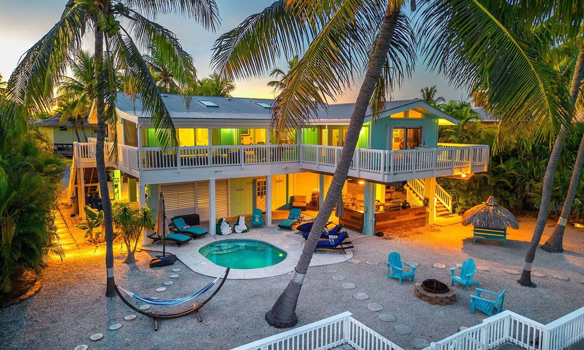 Sugarloaf Shores House | Green Turtle Oasis: 4BR Canal Front Home, Pool, Dockage, Outdoor Dining & Pets