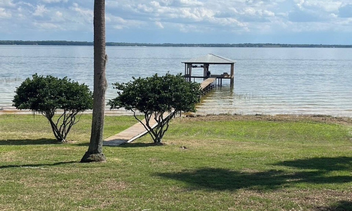 Candler House | Lake Weir North Shore Private Gated Estate Home 105' Lake front w/private dock.