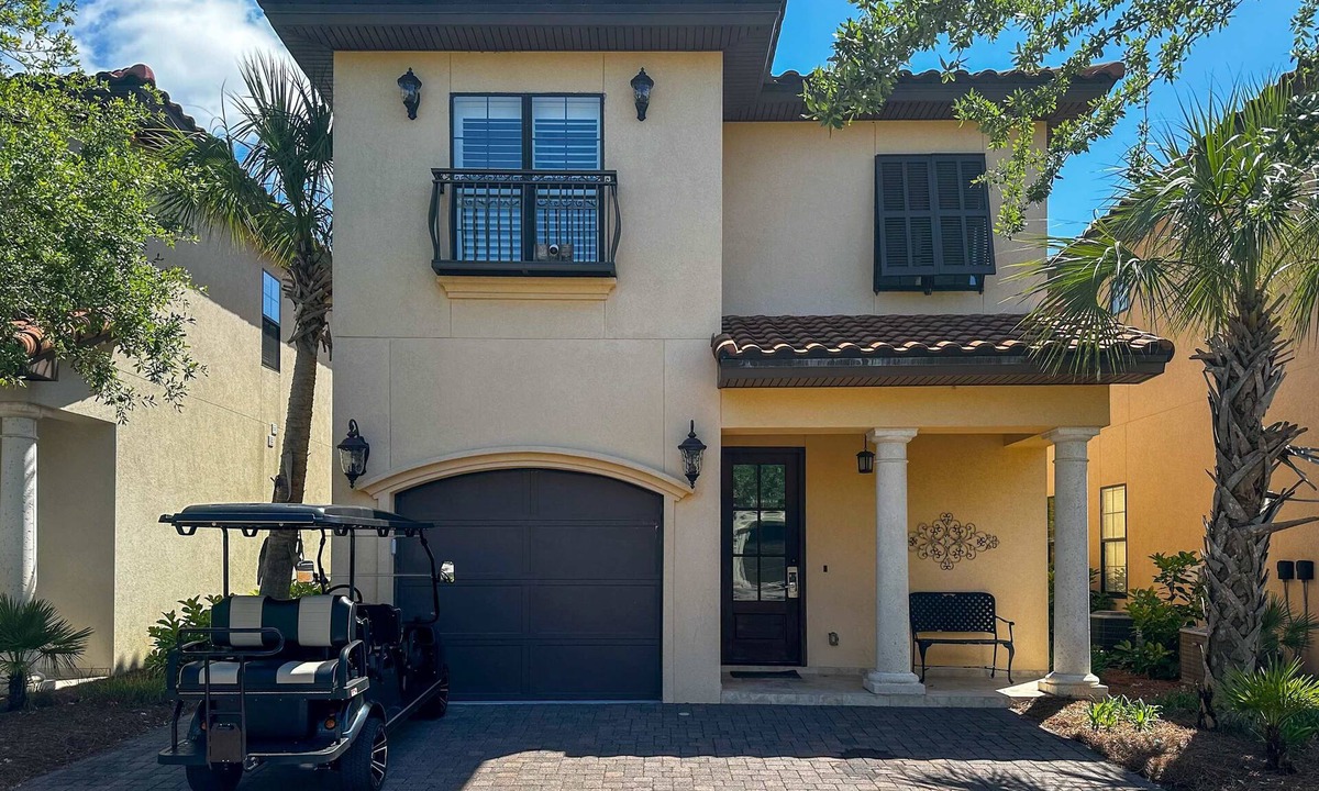 Villa Lago House | Lakefront Mediterranean-style home with pool, tennis & 6-seater golf cart