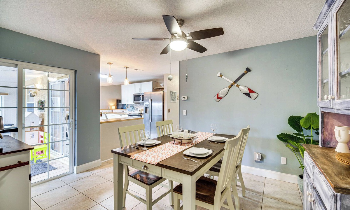 Surfside Estates Cottage | Lovely Merritt Island Home w/Kayak + Fire Pit!