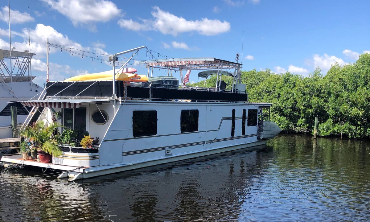 Lochmoor Waterway Estates Boat Rental | Luxurious floating condo ! very private with great river views