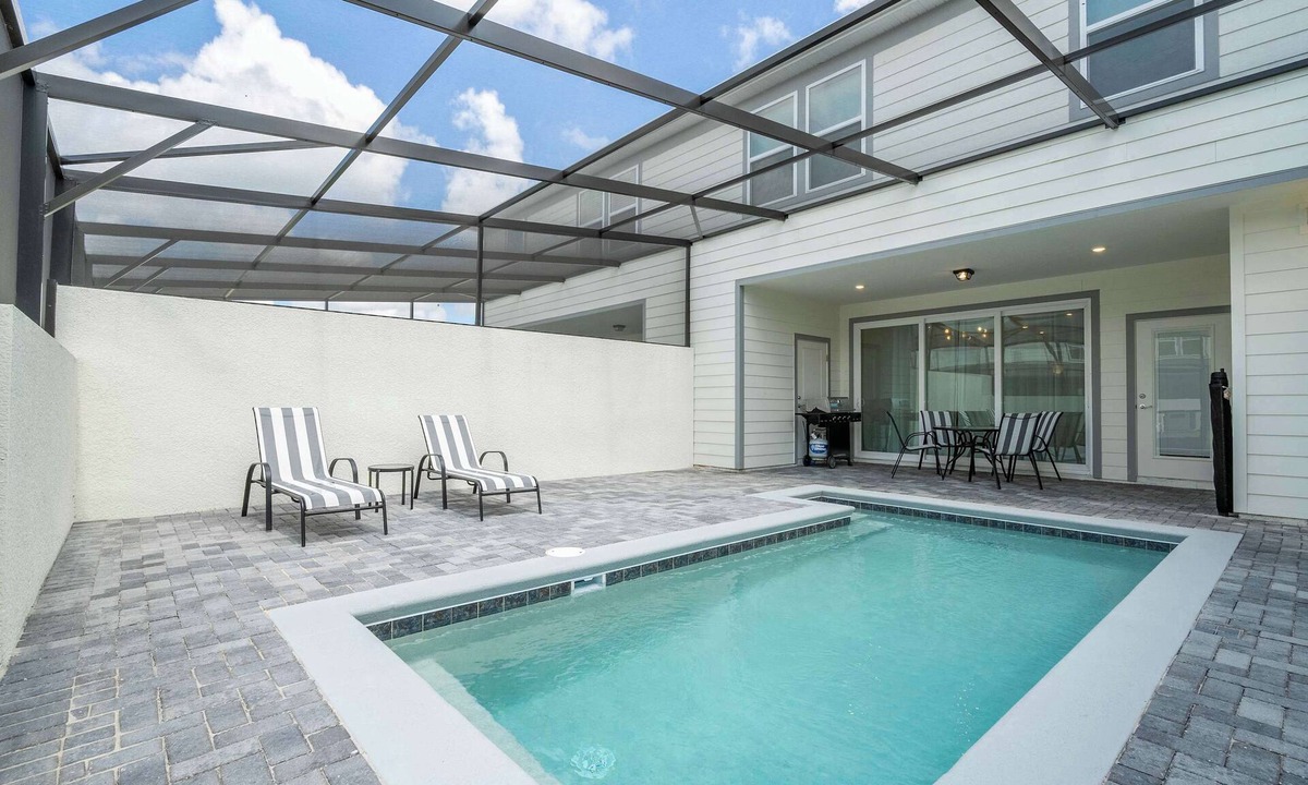 Four Corners House | Luxury 5BR Windsor Cay Villa - Pool & Themed Rooms