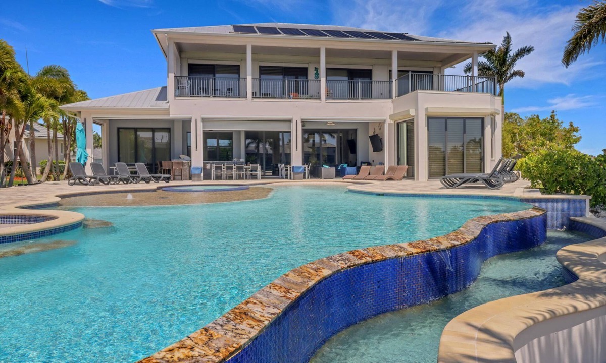 Pelican House | Luxury Cape Coral Estate | Stunning Waterfront | Saltwater Lagoon Pool, Spa & Sprawling Sun Deck