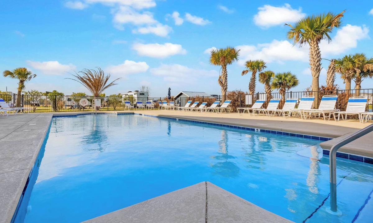 Foley RV Rental | Luxury RV Pad w/Pergola, Dining Area & Heated Pool - No RV Included