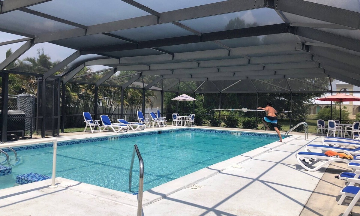Flamingo Bay House | Manatee Lookout Cottages - Boat to Beach, Dock, Pool, Kayaks, Direct Gulf Access