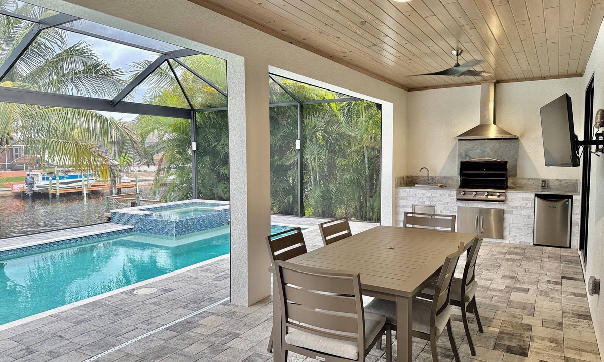 Pelican House | New Spa/Pool home w/Large Lanai in SW Cape! Swim, Fish, Boat, Relax & Enjoy!