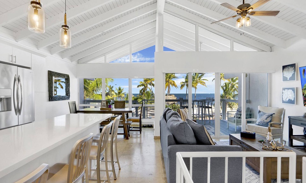 Rock Harbor House | Ocean Front Villa with endless Views, golf cart, paddle boards, kayak and bikes