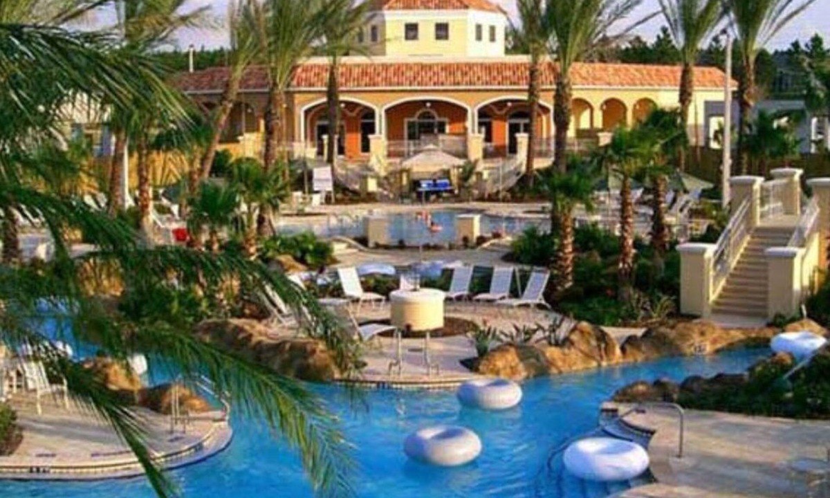 Regal Palms Resort | Orlando Lazy River Oasis with Game Room, Bar, Restaurant, Water Slide & Hot Tub