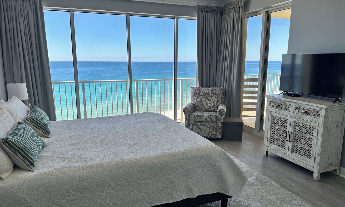 Panama City Beach Condo | PARADISE AWAITS! Enjoy the melody of waves and panoramic views from your balcony
