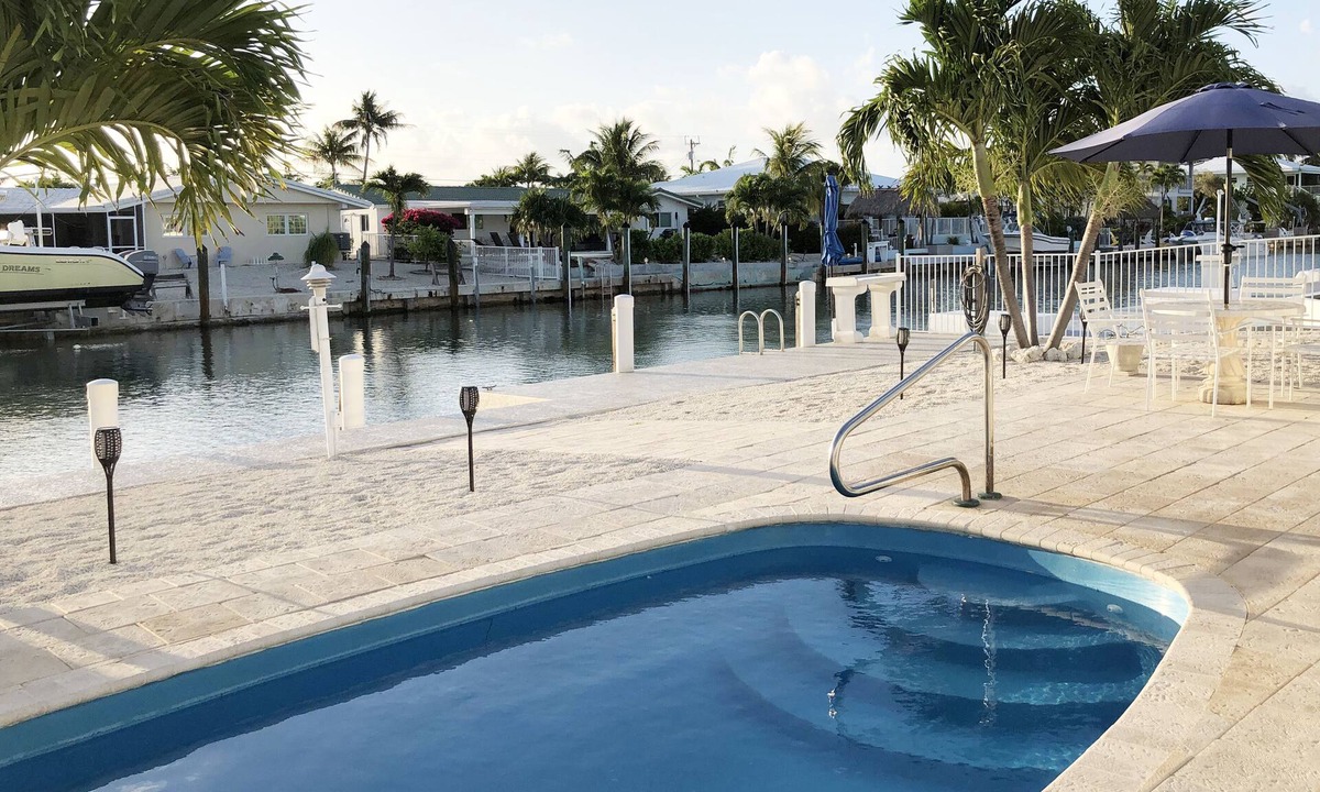 Key Colony Beach House | Peaceful canal-front 3/3 Single-Family Home w/Private Pool & Cabana Club Access