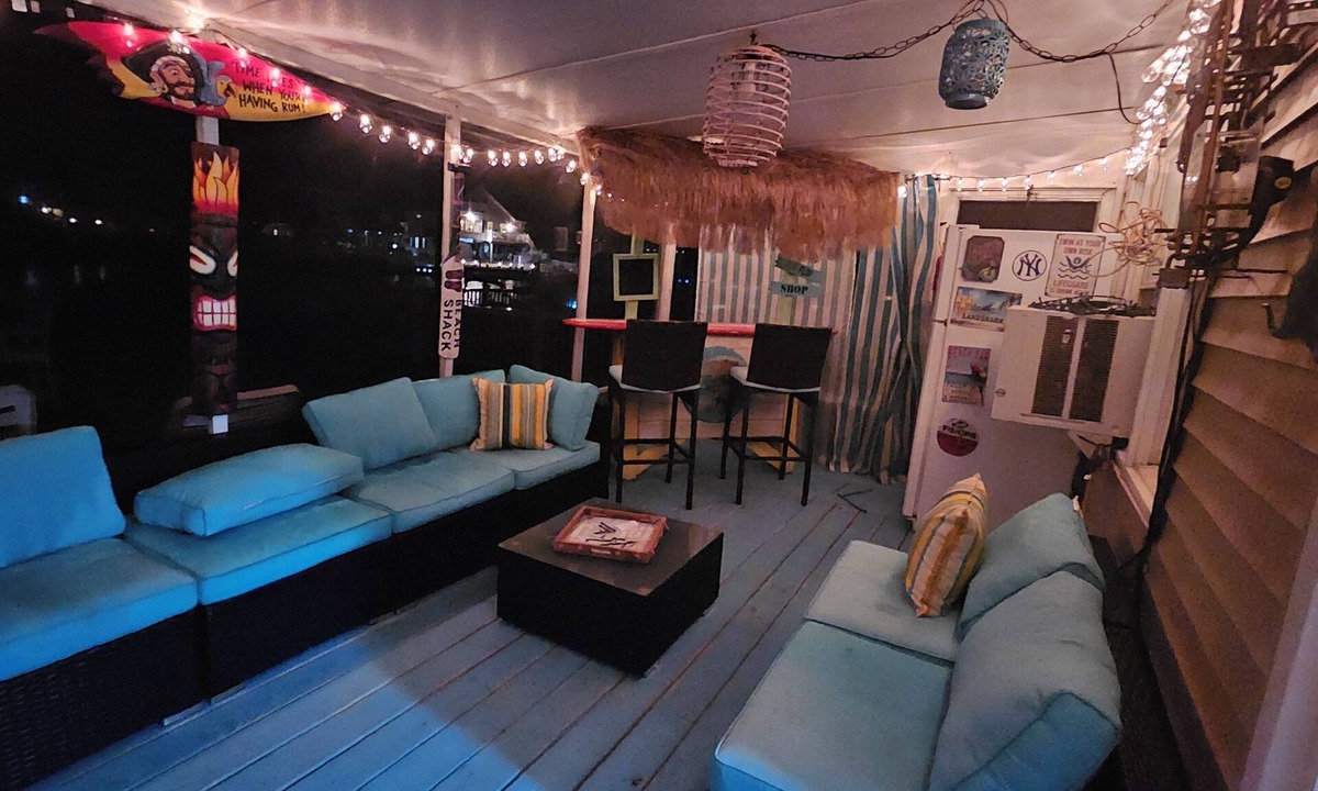 Mystic Island House | *Pet-Friendly Waterfront Tiki Escape with Fire Pit, bars, screened in porch
