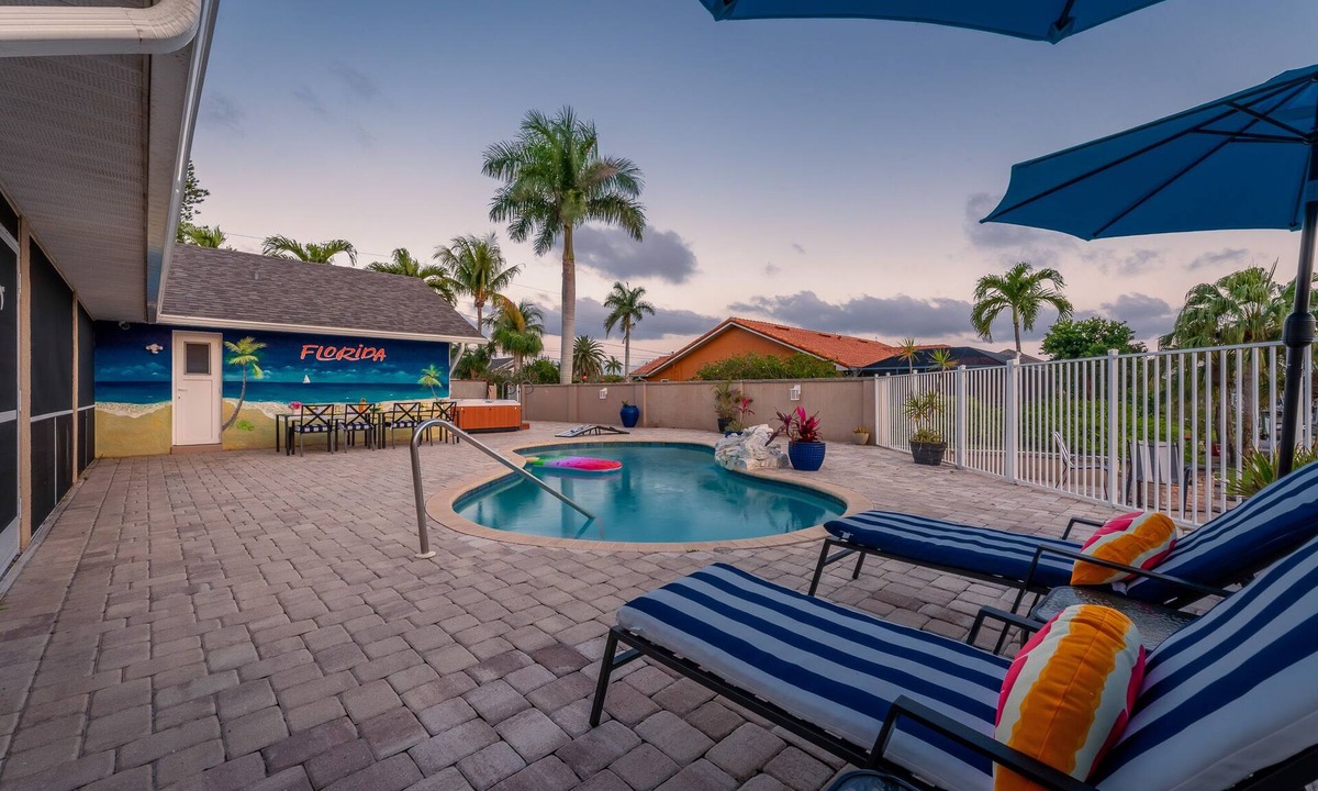 Caloosahatchee House | Poolside Paradise -heated pool, hot tub and game room! Waterfront Canal Views!