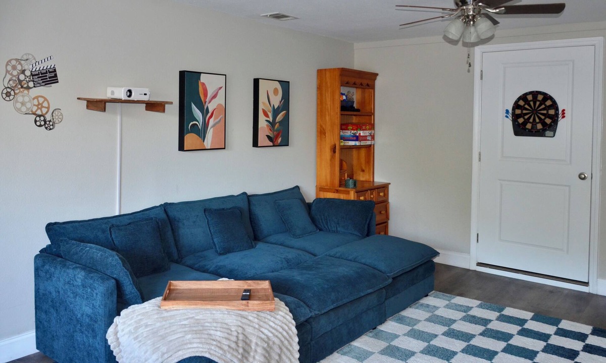Mary Esther House | Sleeps 8! Pet friendly retreat by the beach + movie room and large fenced yard