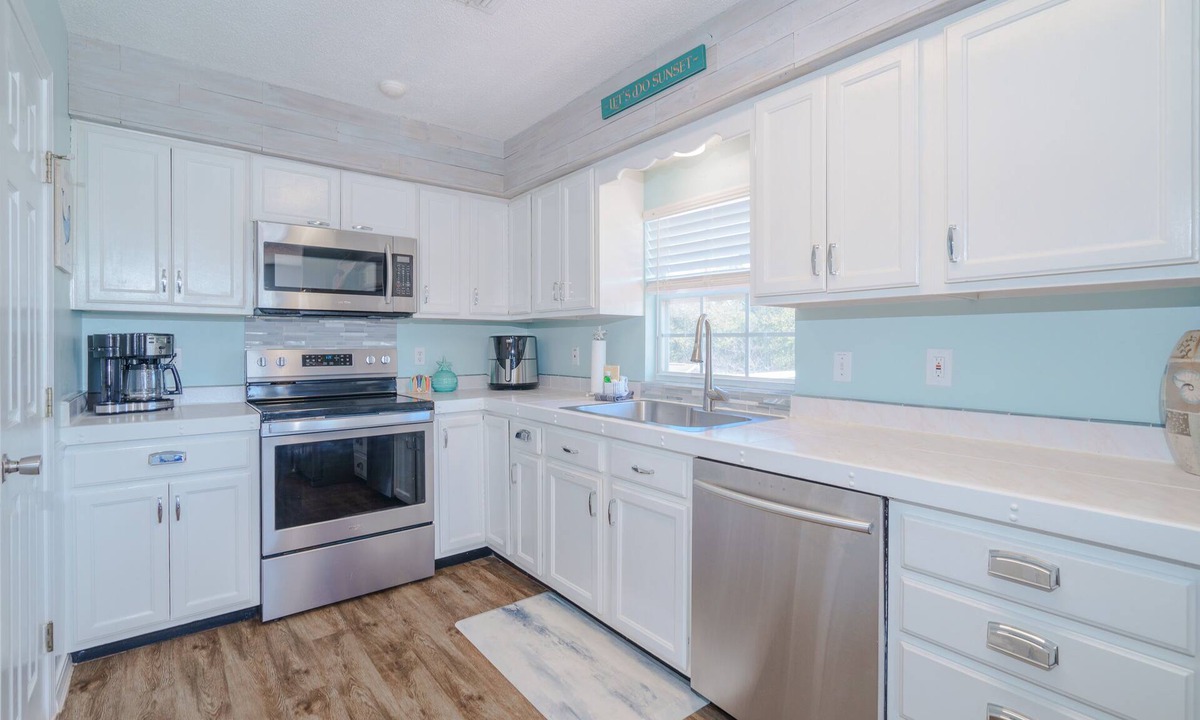 Holiday Beach House | Sunset Lagoon | 3BR Beach Home, Large Deck, Fenced Yard, Walk to Sand & Shops