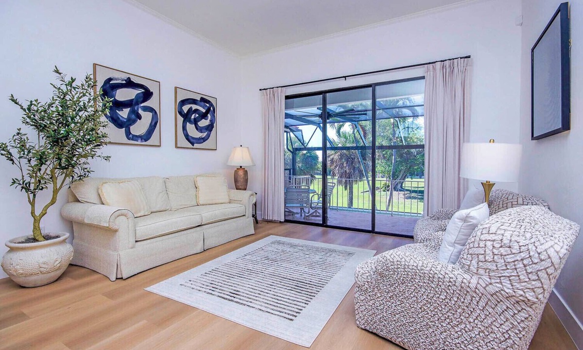Beachview Country Club Estates House | Tin Cup - Beachview Estates home with pool on golf course