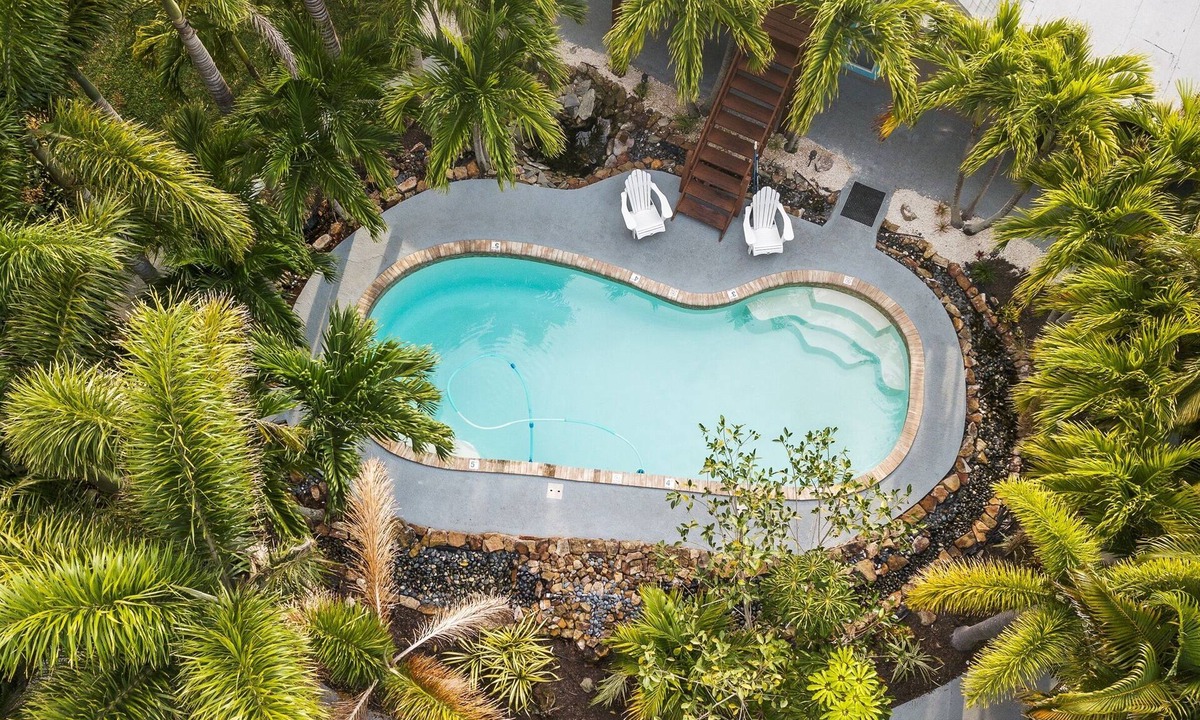 Whitney Beach House | Tropical Oasis Near AMI | Pool + Dogs Welcome