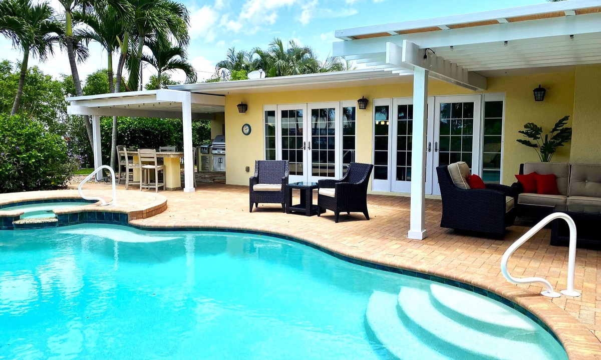 Yacht Club House | Tropical private oasis pool home w/hot tub, areas to relax on Gulf Access Canal