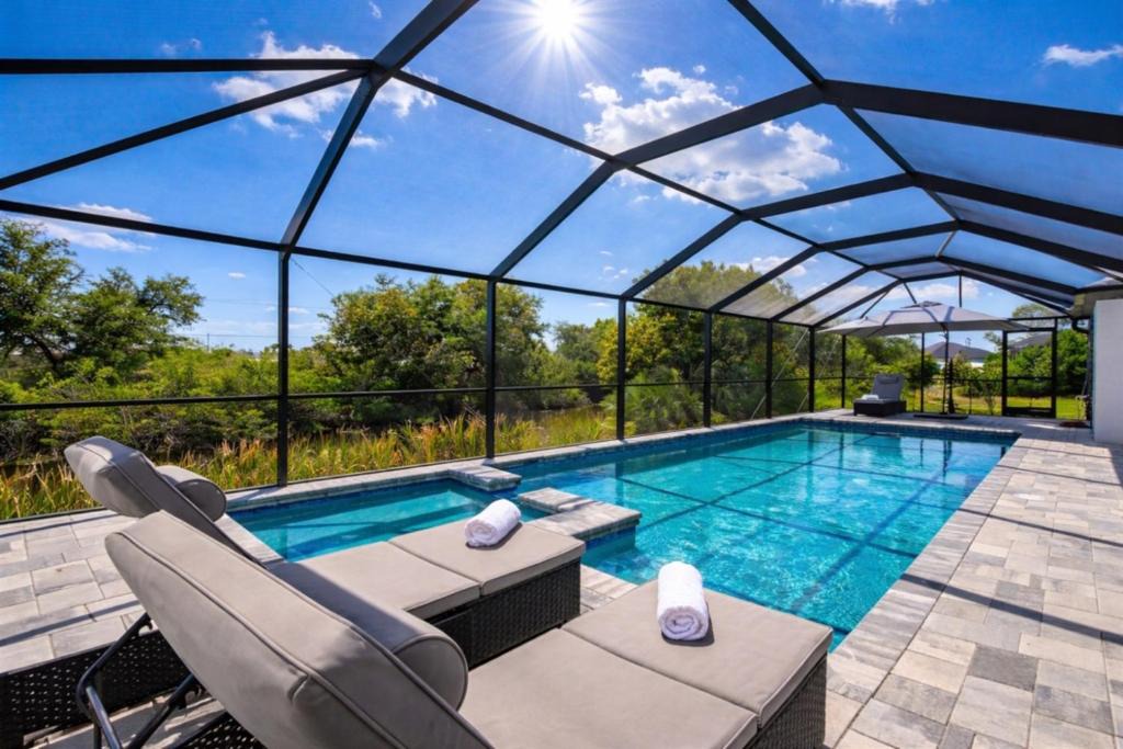 Mariner Villa | Villa Capeside Waterfront Home with Heated Pool & Spa