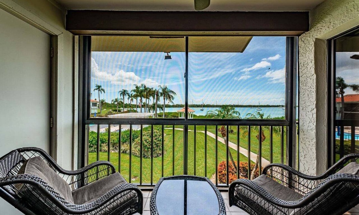 Isla del Sol Villa | Waterfront 2BR/2BA condo in St. Petersburg with pool, hot tub, and balcony.