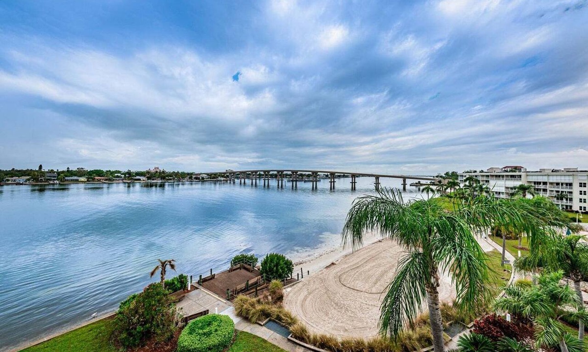 Isla del Sol Condo | Waterfront 2BR condo in St. Petersburg with balcony, pool, and hot tub.