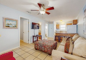 Beachside home steps from the water with pool access & central AC