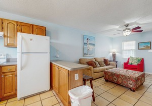 Beachside home steps from the water with pool access & central AC