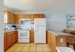 Beachside home steps from the water with pool access & central AC