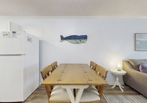 Casual condo steps from the beach with AC, balcony, resort pools, & free WiFi