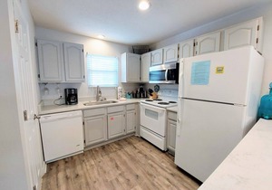 Cute, beach side condo! Sunrise Village 117 | Easy Beach Access | Updated Interior | Pool