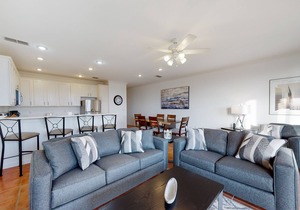 Newly renovated waterfront condo with pool, WiFi, W/D, & central AC